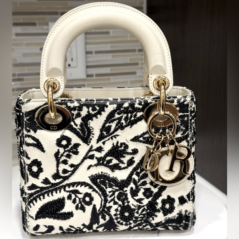 LADY DIOR SMALL IN LIKE NEED COND.  ALL HAND-BEADED AND STITCHED.